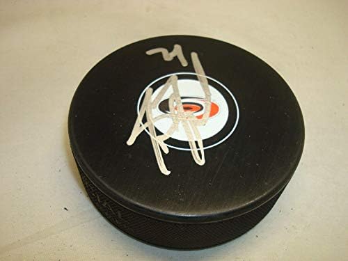 Джъстин Фолк подписа Хокей шайба Каролина хърикейнс с Автограф 1А - за Миене на НХЛ с автограф